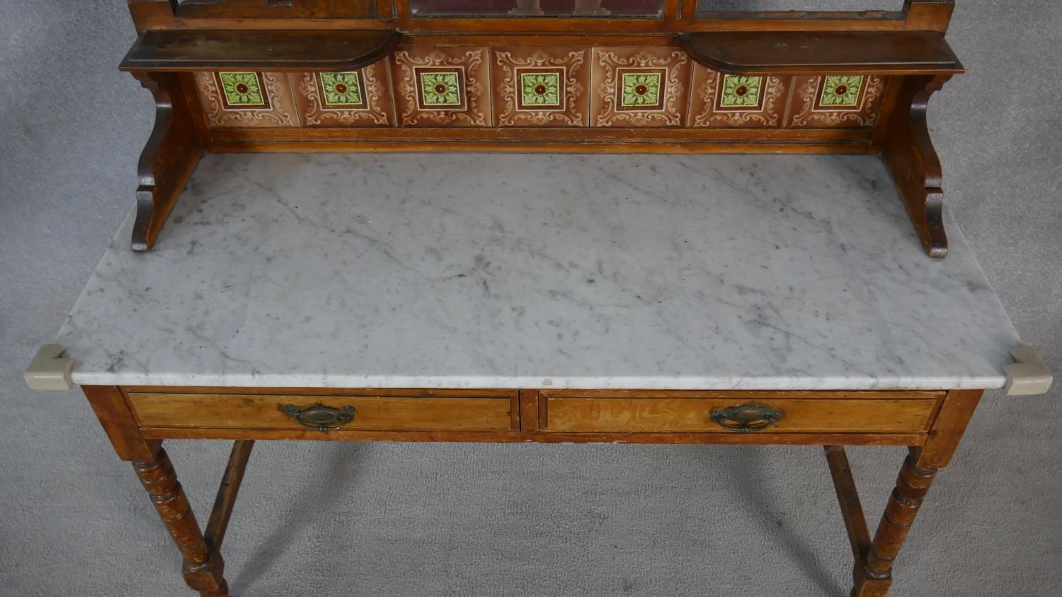 A late Victorian satin walnut washstand with carved and tiled mirrored upstand above marble top - Image 12 of 12