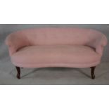 A French style two seater canape in blush buttoned velour upholstery on cabriole supports. H.64 W.