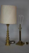 A brass Corinthian column table lamp base and an Eastern style brass table lamp and shade. H.51cm (