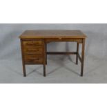 A mid century Edgleys oak and metal framed industrial style pedestal desk with maker's label to