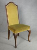 A mid century carved walnut framed early Georgian style side chair on cabriole pad feet supports.