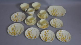 An antique Crown Staffordshire hand painted china tea set. Includes 3 cups with saucers, four