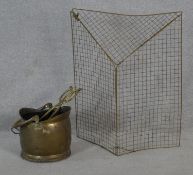 A 19th century brass coal bucket with tongs along with a brass folding mesh fire guard. H.75 W.61cm