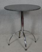 A polished stone topped occasional table on chrome space age quadruped supports. H.77 D.69cm