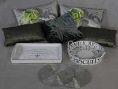 A collection of contemporary trays, beaded place mats and five silk and velvet designer cushions,