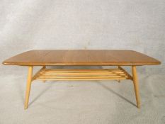 A mid century blonde elm and beech Ercol Windsor coffee table, model 459 with maker's label to the