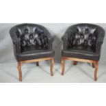 A pair of piped and buttoned back leather tub chairs on cabriole supports. H81. W63. D77