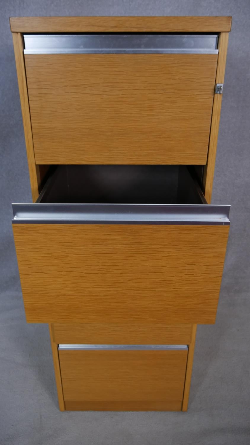 A vintage light oak veneered and aluminium four drawer filing cabinet with lock and key. H.133 W. - Image 4 of 6