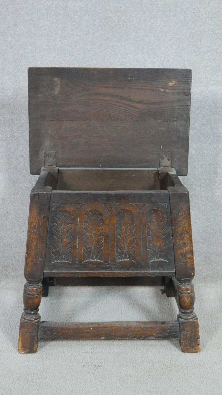 A 19th century oak Jacobean style joint stool with carved panelled coffer section on turned - Image 2 of 4