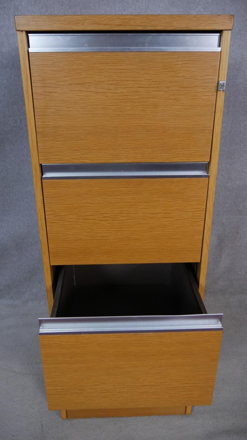 A vintage light oak veneered and aluminium four drawer filing cabinet with lock and key. H.133 W. - Image 3 of 6