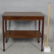 A C.1900 mahogany and satinwood inlaid two tier occasional table. H.76 L.84 W.53cm