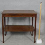 A C.1900 mahogany and satinwood inlaid two tier occasional table. H.76 L.84 W.53cm