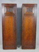 A pair of Victorian carved walnut hall cupboards with panel doors enclosing hanging space. H.183 W.
