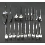 A collection of as new Christofle, Paris stainless steel cutlery. With a geometric angular