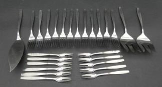 A collection of stainless steel as new Christofle, Paris cutlery. To include eleven pickle forks,