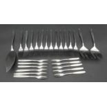 A collection of stainless steel as new Christofle, Paris cutlery. To include eleven pickle forks,