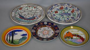 A collection of ceramics. Including Two Wedgwood limited edition Clarice Cliff plates, one 'Blue