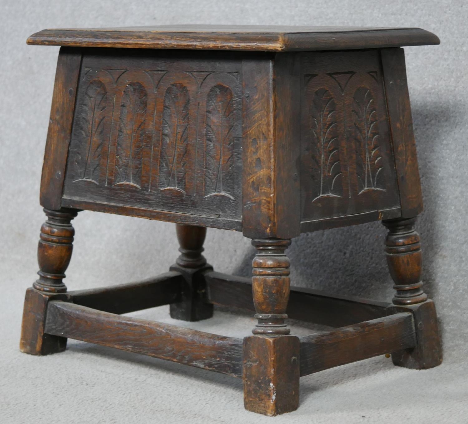 A 19th century oak Jacobean style joint stool with carved panelled coffer section on turned - Image 4 of 4