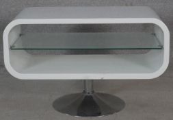 A contemporary occasional table or T.V. stand on metal tulip base. H.50.5 W.80 D.40cm