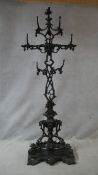 A late 19th century Coalbrookdale cast iron hallstand of naturalistic branch form with impressed