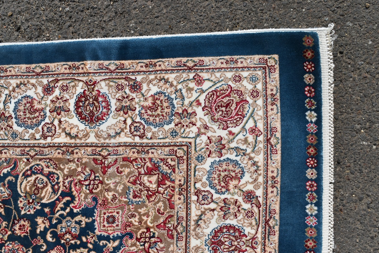 A Persian style rug with central floral medallion on a sapphire ground contained by naturalistic - Image 3 of 4