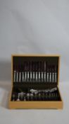 A boxed canteen of stainless steel cutlery for eight settings. W.33.5 D.45.5cm