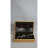 A boxed canteen of stainless steel cutlery for eight settings. W.33.5 D.45.5cm