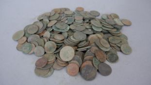 A collection of antique coins from metal detecting. Gross weight: 1520g