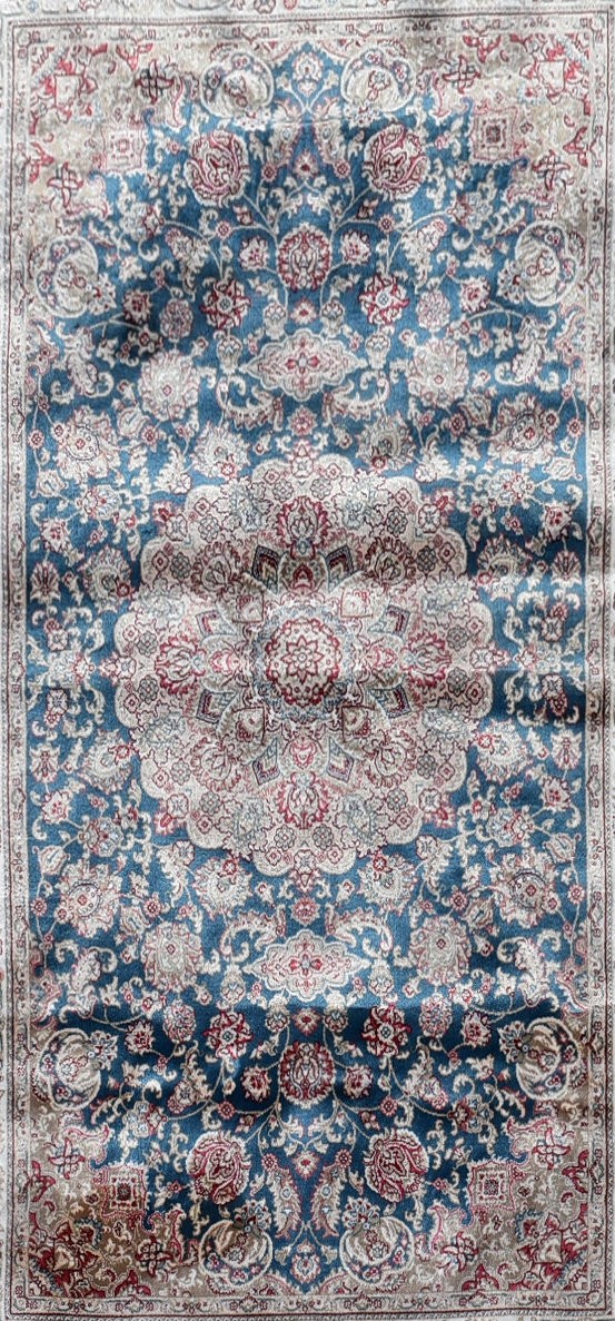 A Persian style rug with central floral medallion on a sapphire ground contained by naturalistic - Image 2 of 4