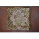 A pair of Aubusson style floral design cushion covers. L.52 W.52cm