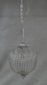 A vintage style chrome mesh globular form ceiling light chandelier with glass drops. H.40cm (