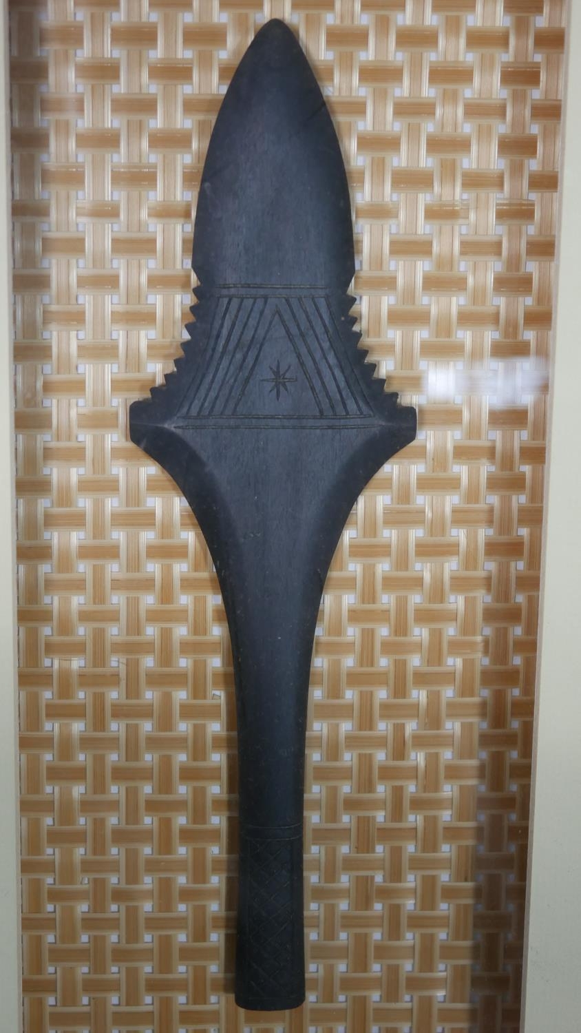 A framed and glazed Asian painted wooden dagger mounted on woven bamboo matting. H.53 W.28cm - Image 4 of 6