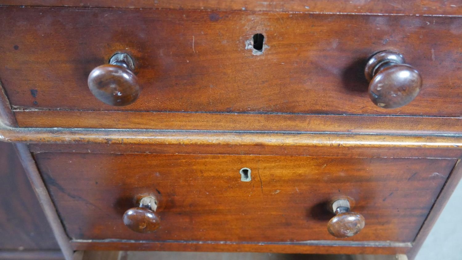 A 19th century mahogany pedestal desk with an arrangement of drawers and kneehole cupboard on plinth - Image 7 of 10
