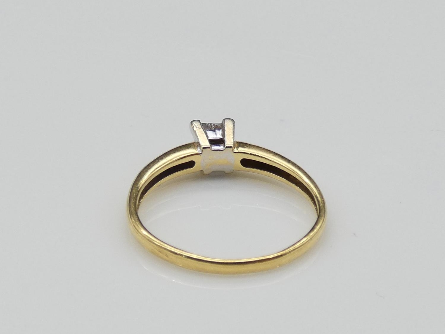 A vintage 18 carat yellow gold, platinum and diamond ring. Set with four square princess cut - Image 3 of 4