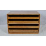 A vintage teak plan chest or linen cabinet fitted with slides on plinth base. H.69 W.101.5 D.66cm