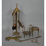 A brass fireside companion set, two trivets and various brass items. H.58cm (companion set)