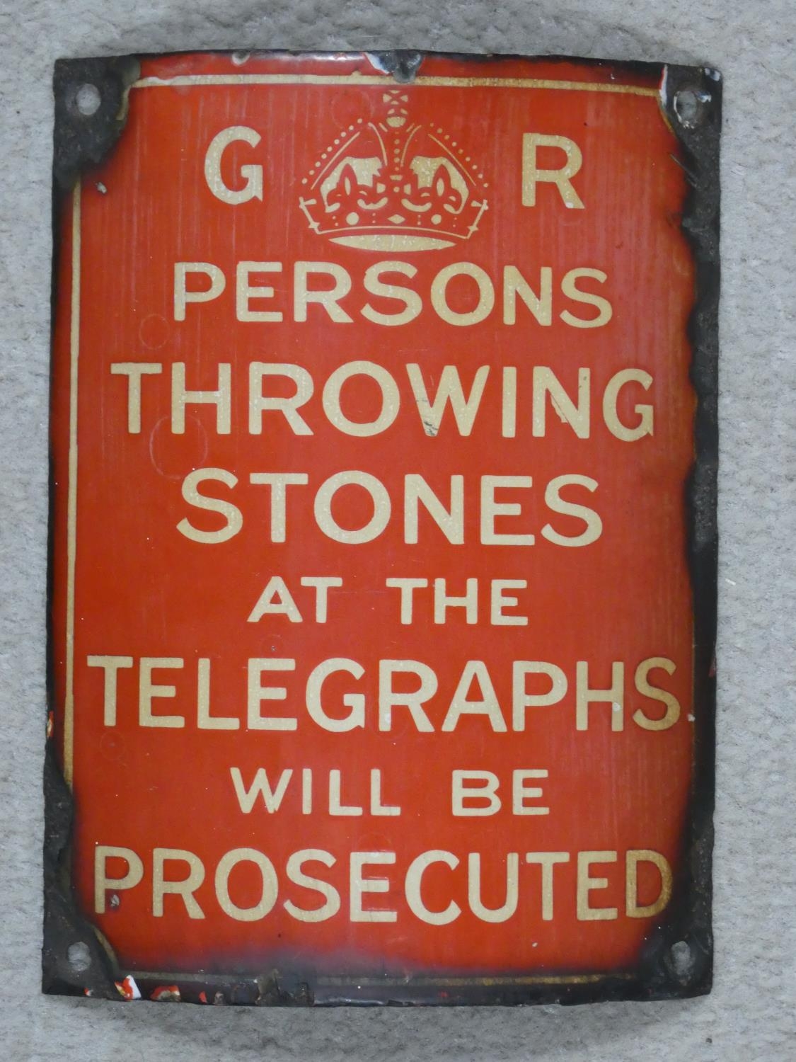 A vintage enamel and metal warning notice by order of King George. 20x16cm