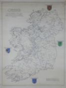 A framed and glazed hand coloured map of Ireland. Showing the principal Irish families and regions