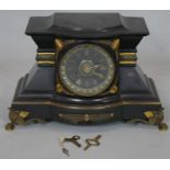 A 19th century French style mantel clock by Hamann and Koch with all over ormolu mounts on scrolling