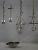 A pair of vintage French brass hanging ceiling lights, a similar pair, one with glass dome and a