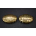 Two antique engraved oval brass Welsh miners snuff boxes. One inscribed John Thomas, 1903, Ogmore