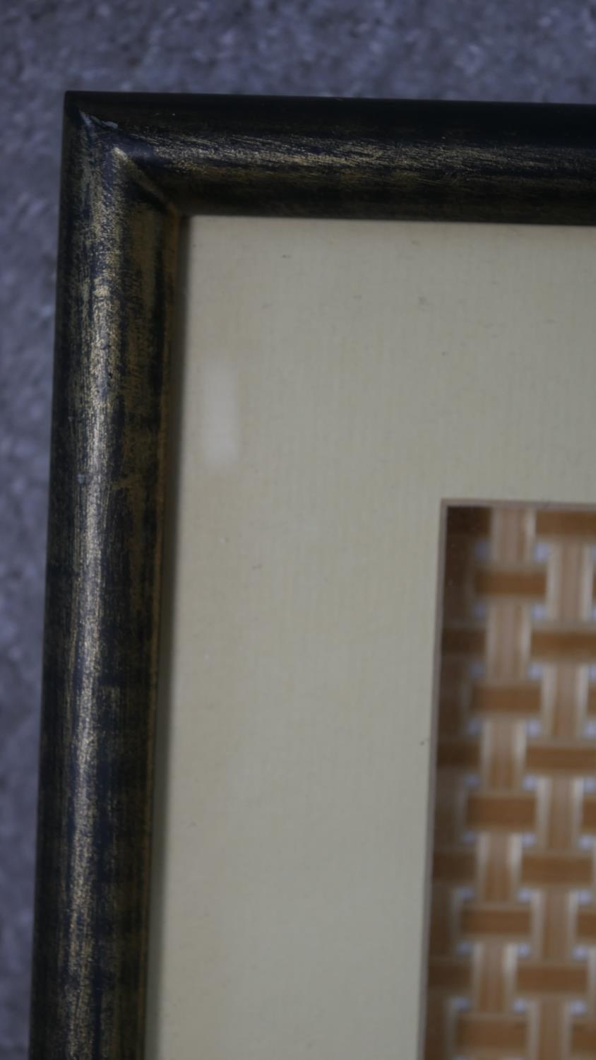 A framed and glazed Asian painted wooden dagger mounted on woven bamboo matting. H.53 W.28cm - Image 5 of 6
