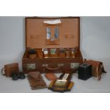 A collection of items. To include a Lufft Art Deco veneered Barometer, a leather suitcase with