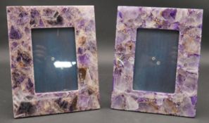 A pair of contemporary amethyst in resin easel photo frames. H.25.5 W.20.5cm