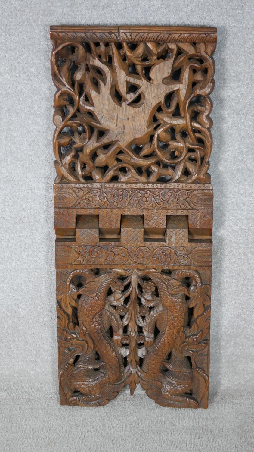 An Anglo-Indian carved pierced hardwood book stand. Decorated with dragons, foliage and flowers - Image 6 of 6