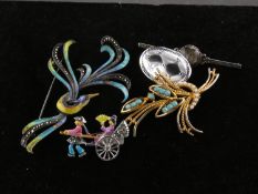 Collection of brooches, Including a silver, enamel and Marcasite phoenix brooch, a plate of white