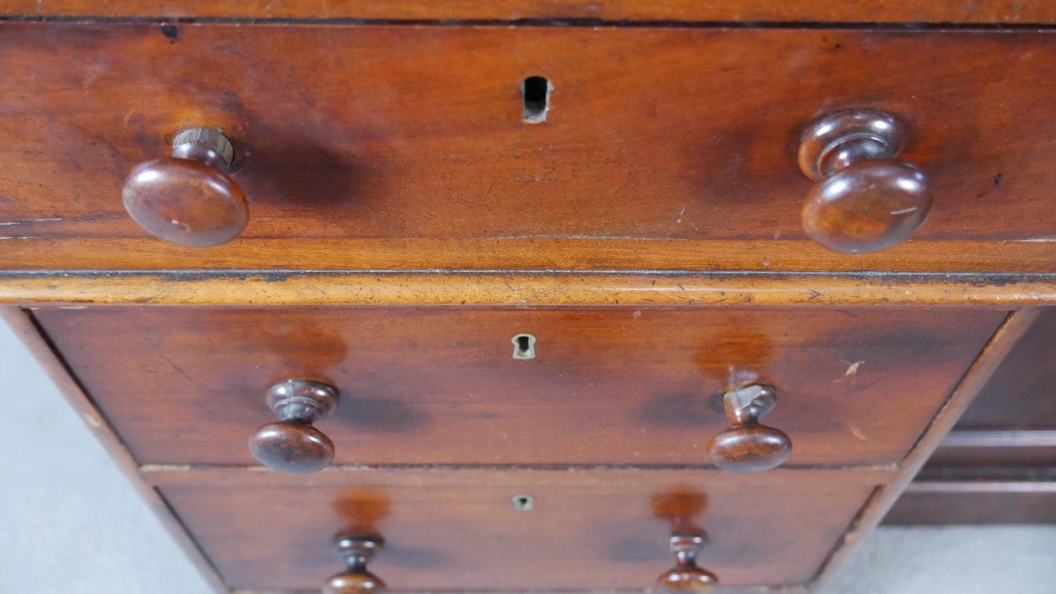 A 19th century mahogany pedestal desk with an arrangement of drawers and kneehole cupboard on plinth - Image 3 of 10