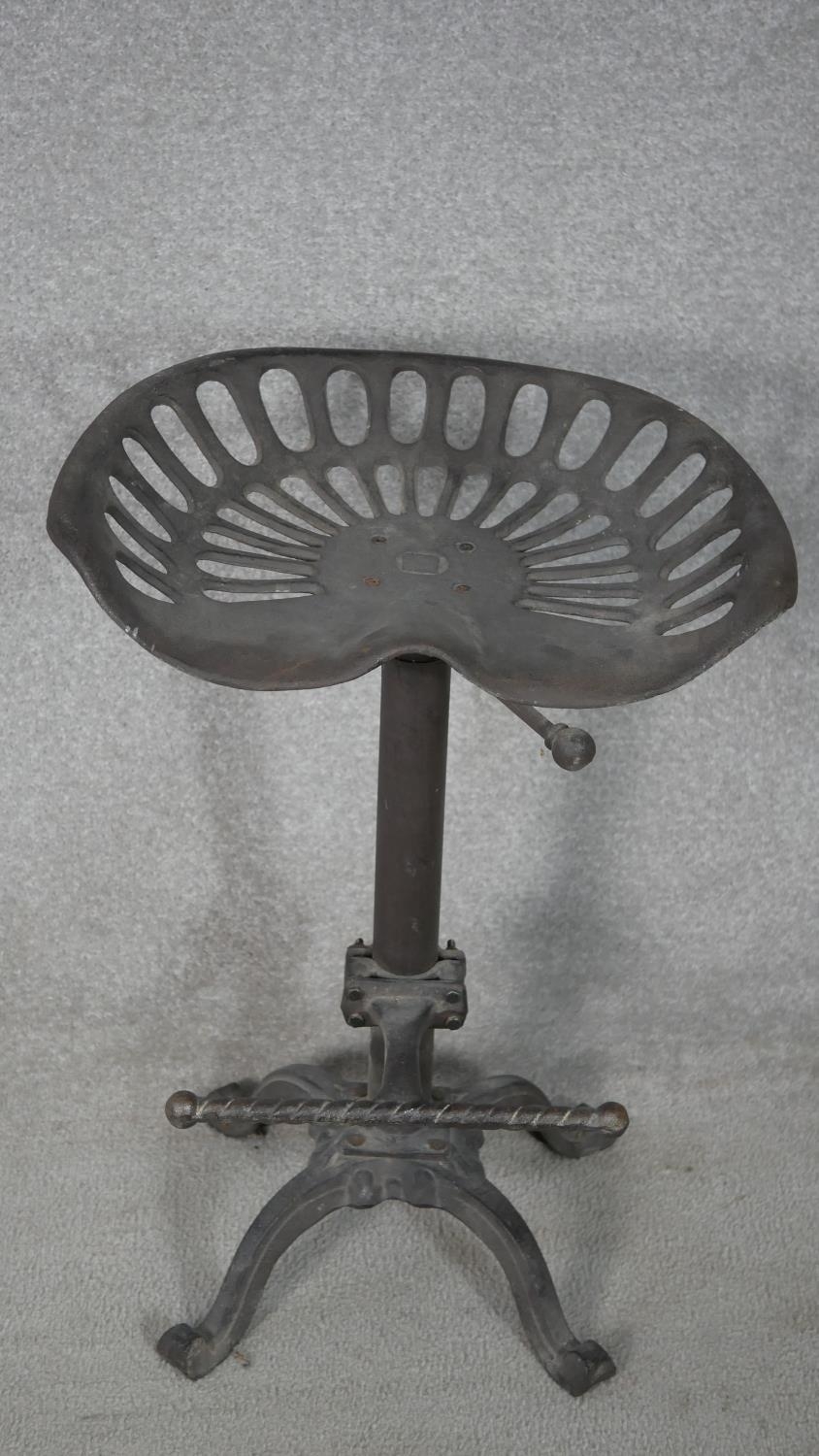 A pair of 19th century style cast iron industrial stools on quadruped supports with footrests. H. - Image 2 of 8