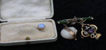 A collection of antique jewellery. Including a yellow metal and seed pearl shell brooch, a jade,