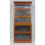 A five section, two tier walnut Globe Wernicke style floor standing bookcase. H.201 W.87 D.47cm (
